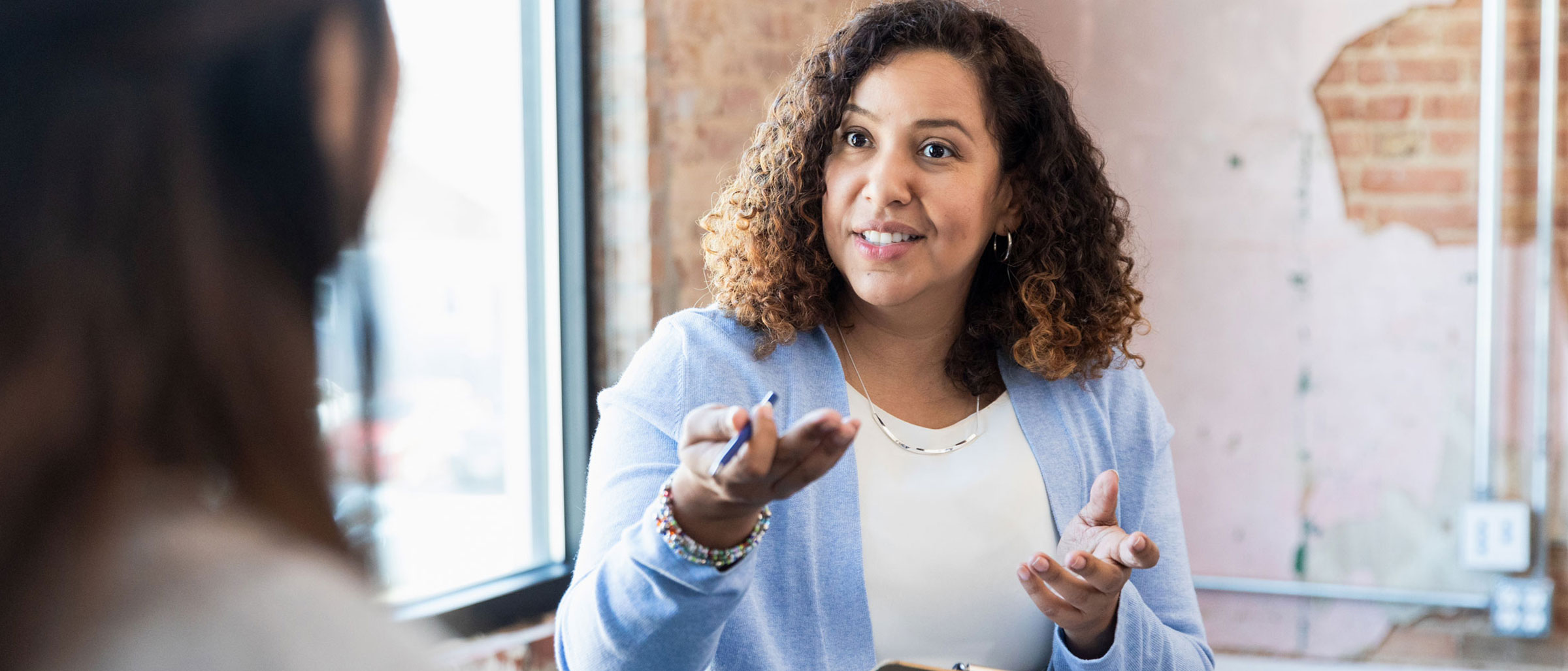 Woman explaining talent acquisition