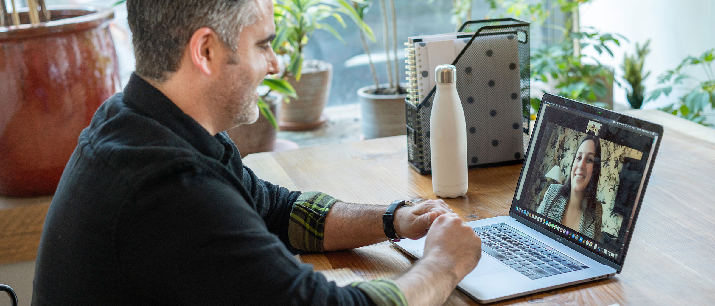 Man on laptop virtual netoworking