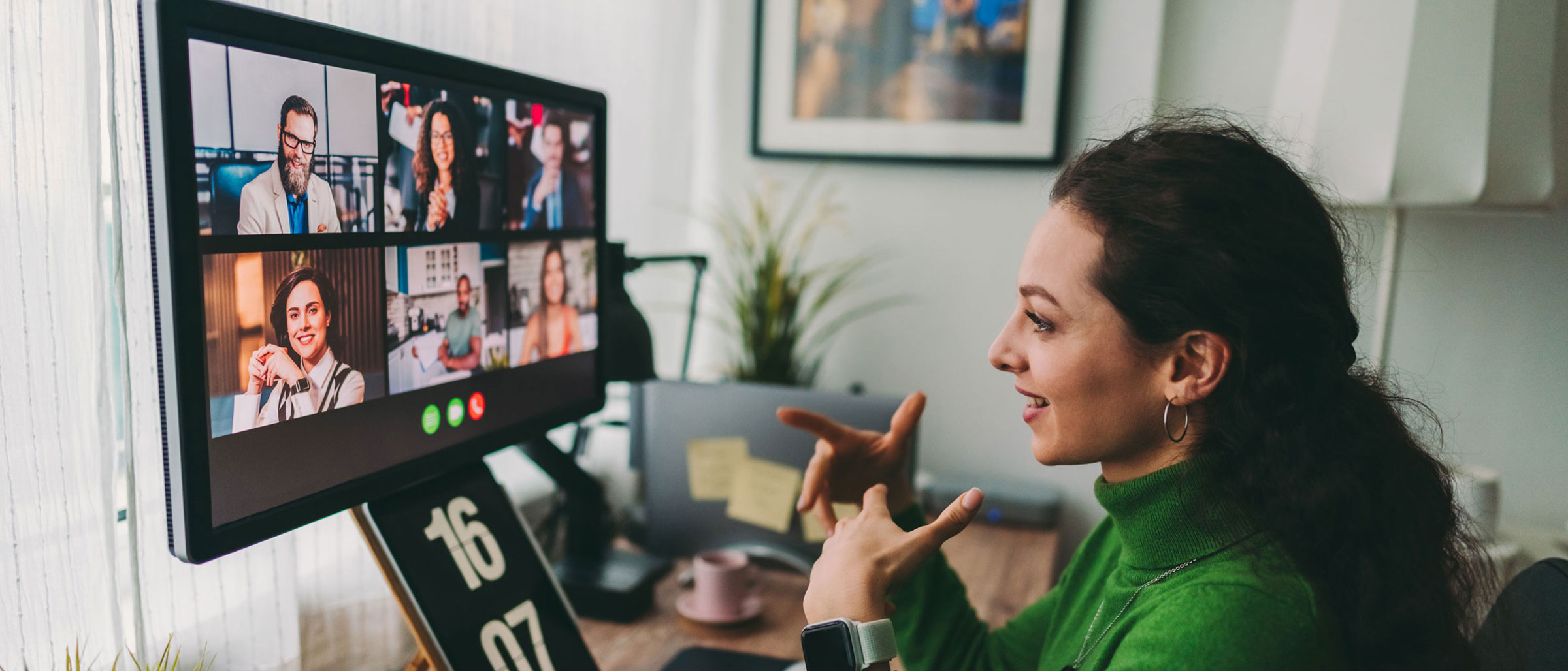 Woman on video call with employees