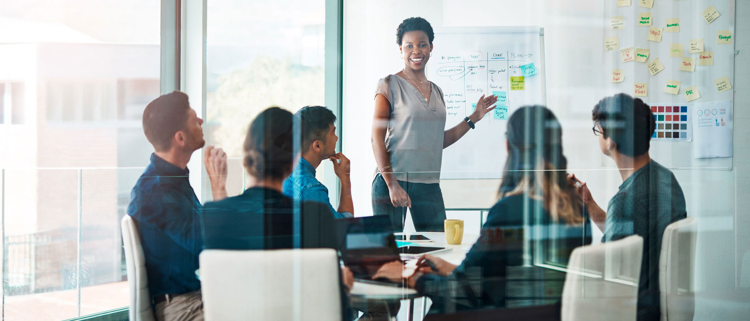 Woman giving instructional design presentation