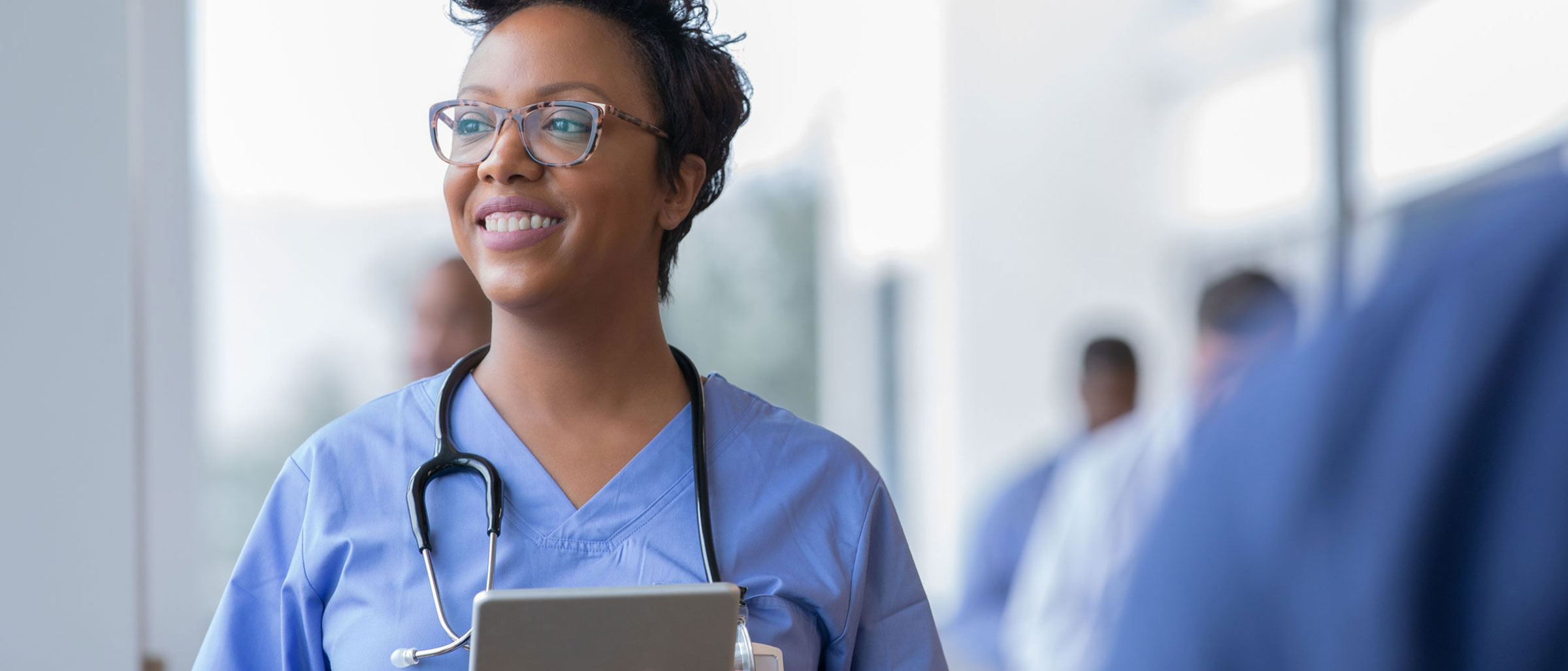 Travel Nurse Smiling, wearing stethoscope