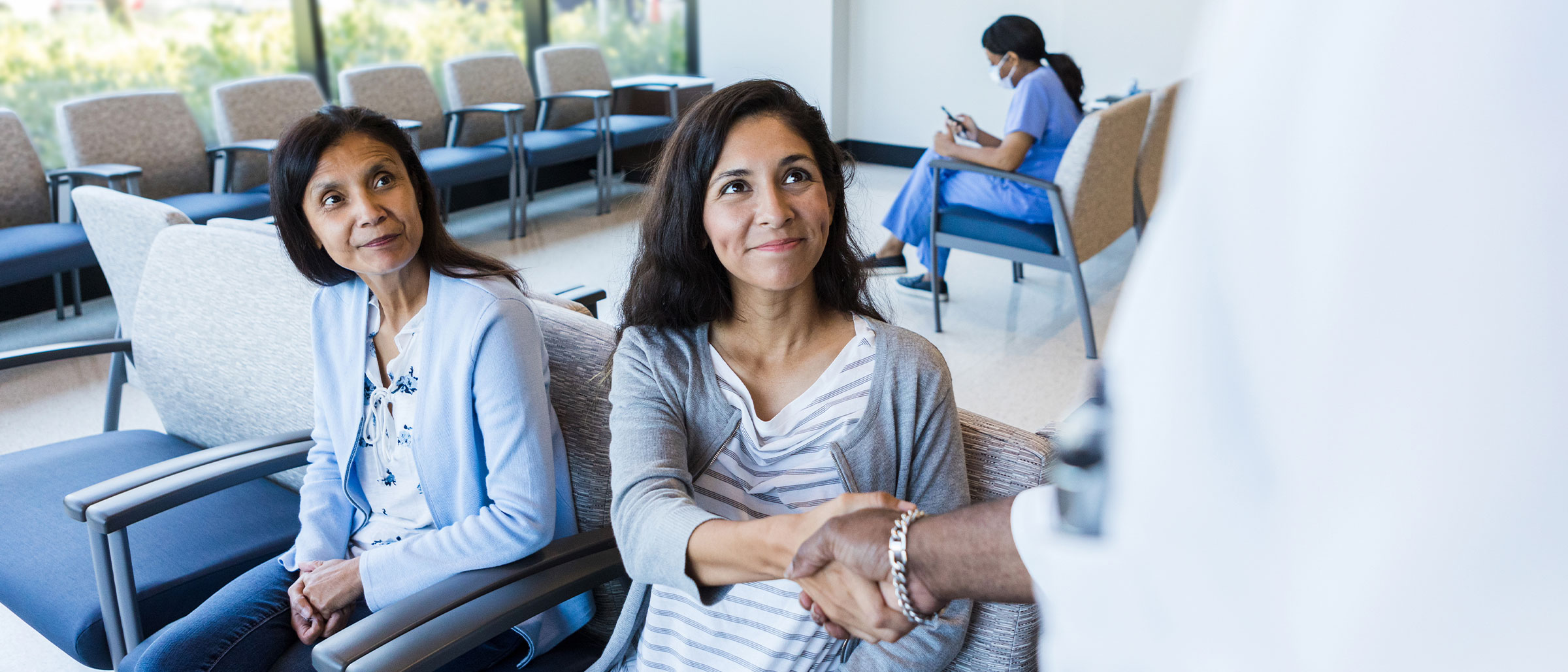 Two female patients in waiting room