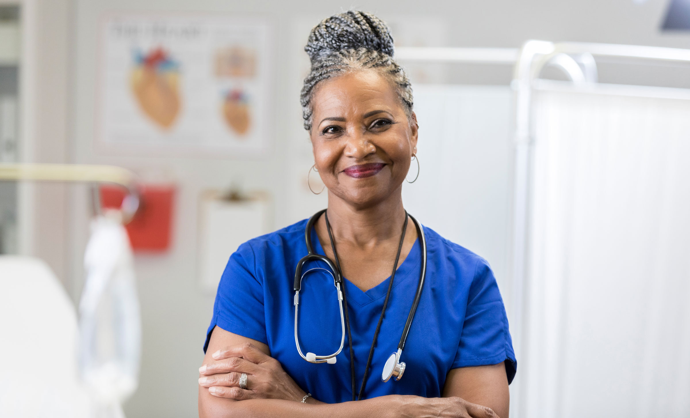 Nurse Smiling with Crossed Arms