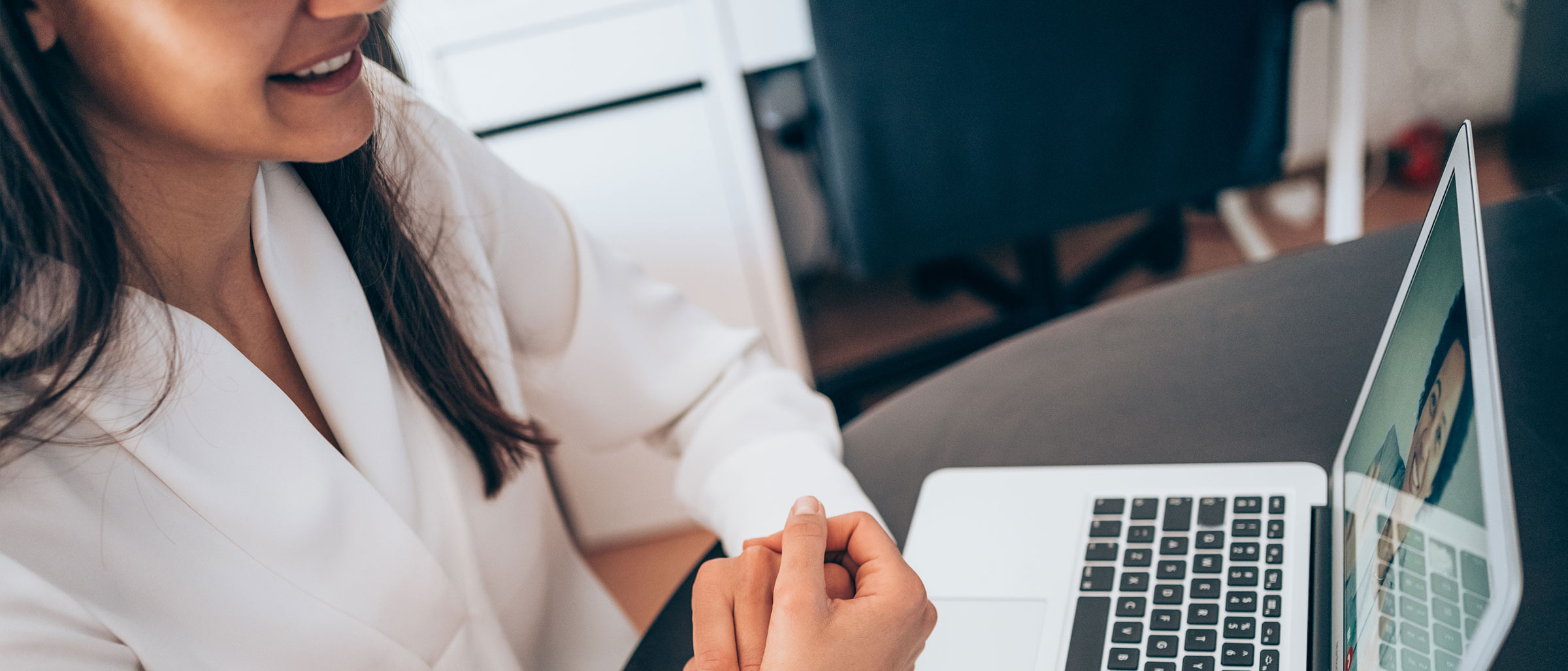 Woman using laptop for video call