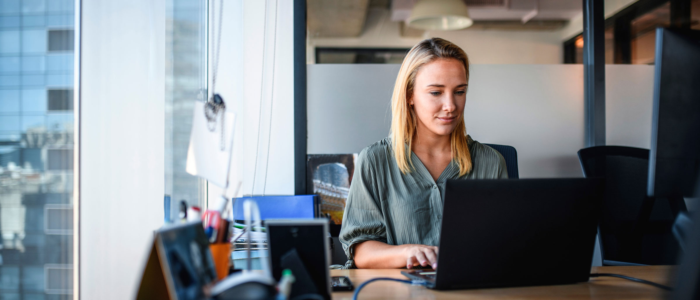 Woman typing on laptop