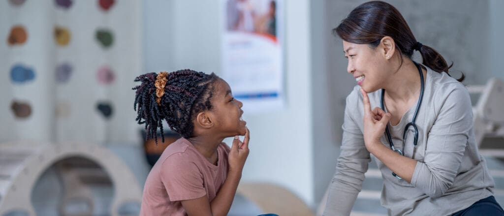 Woman signing with child