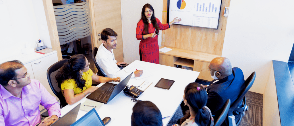 People working in conference room