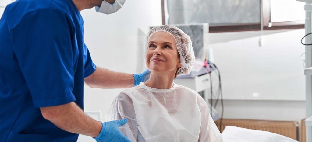 Surgeon Prepping Patient