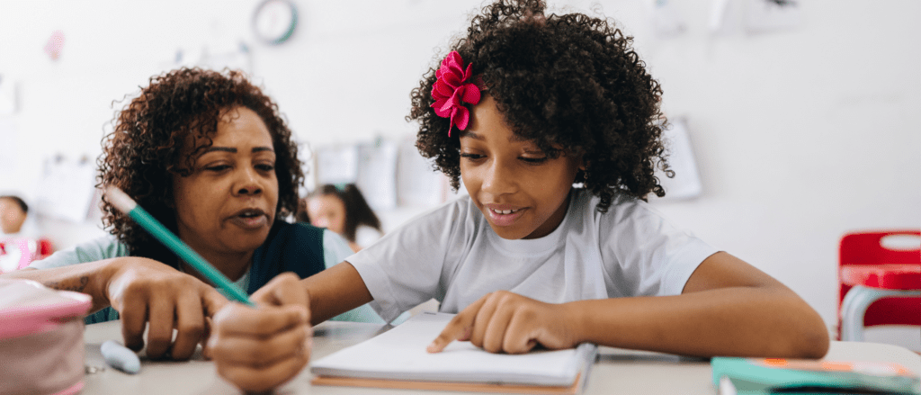 Educational professional working with a child