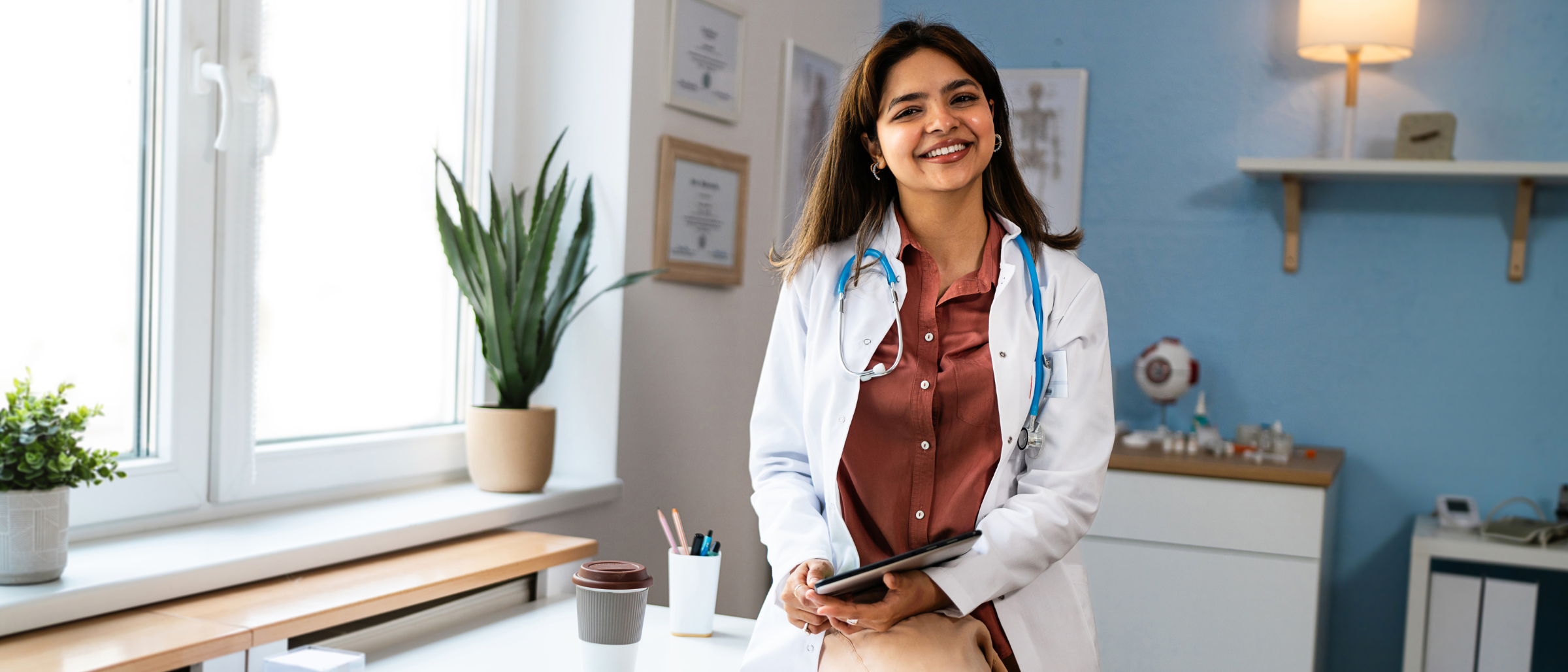 Smiling Nurse Practitioner in an exam room