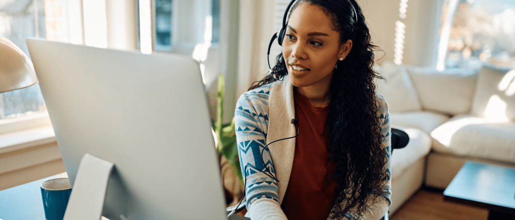 Remote medical coder working in a home office