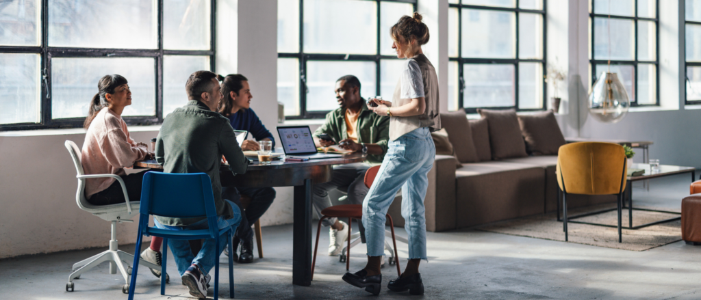 Group of professionals meeting in an open office space