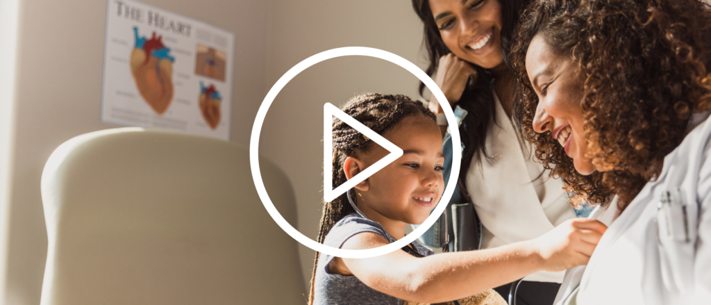 A mother and child in a medical office with a Nurse Practitioner