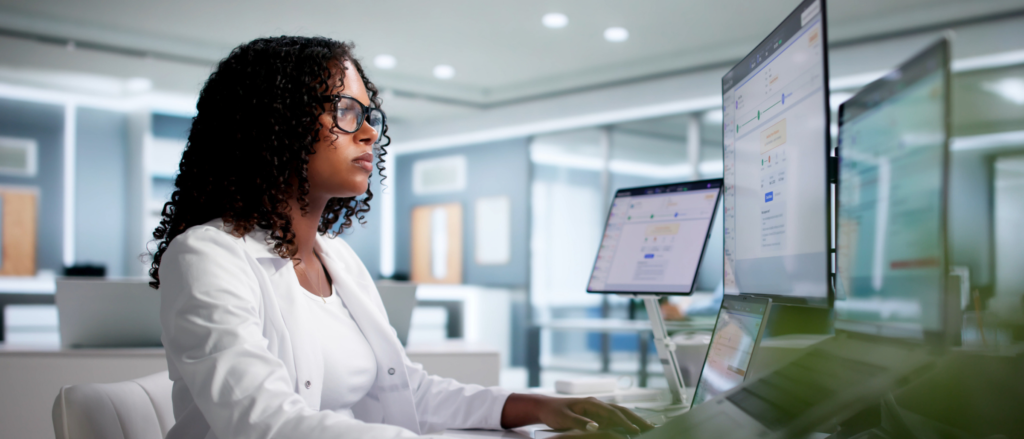Woman working at a computer in an office setting